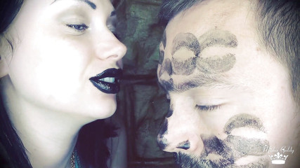 Covering Alex with black shiny lipstick kisses all over his face!
