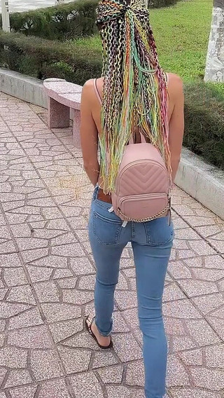 Public Wetting Jeans in Park Near the Beach