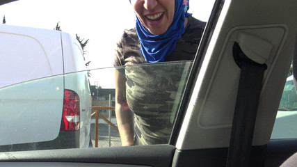 Algerian Prostitute with a Client in Her Car in a Suburb of Marseille