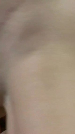 This horny brunette with natural tits enjoys playing with hard cocks by sucking and licking them sensually