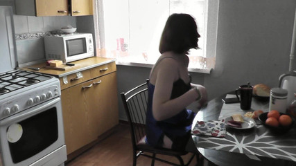 Cute Girl. Sexy Assol in Erotic Lingerie Peignoir Stockings Makes Coffee in Kitchen. Fetish. Erotica of Beautiful Woman. Perfect