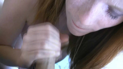 Gorgeous Russian redhead teen sucking a thick hard dick