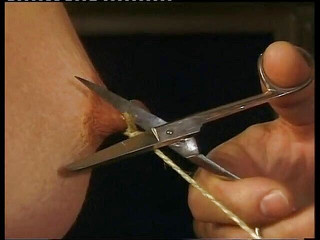 Sweet rude of a tied up girl with outstretched nipples