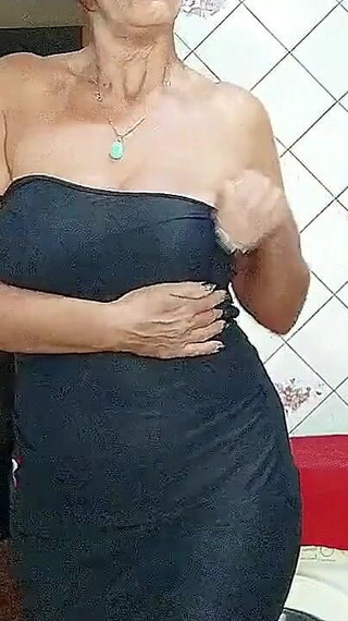 Lonely Hostess in the Kitchen Shows the Beauty of Her Old Sexy Body in Front of a Webcam