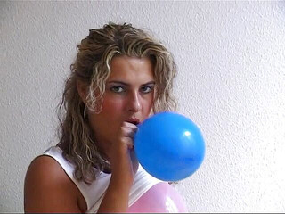 Busty blonde babe loves playing with balloons