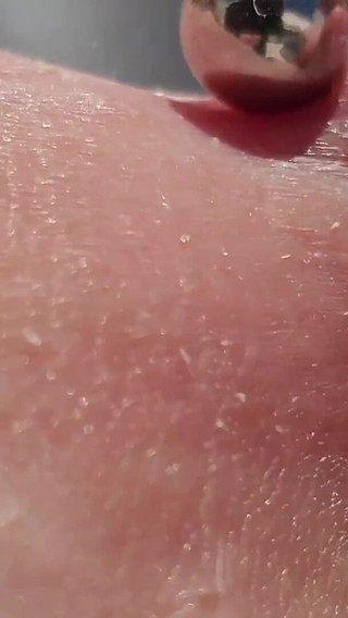 Playing Pierced Nipples Close up on Balcony