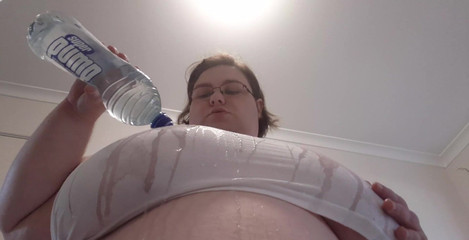 Big wet BBW titties in a tight white shirt and a bottle of water