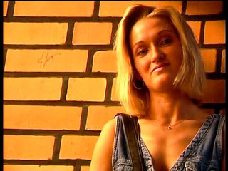 Gorgeous blonde girl being interviewed