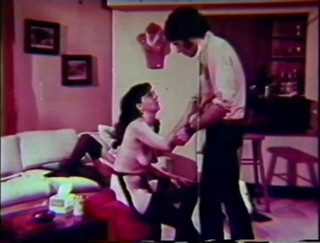 Vintage porn: amazing brunette fucked on a couch.