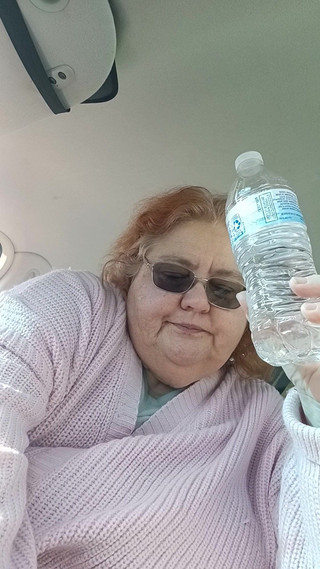 BBW smoking in pink sweater in her car talking to her fans