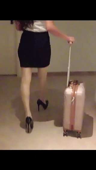MILF in Stockings and Heels Walks Through the Corridors of a Hotel