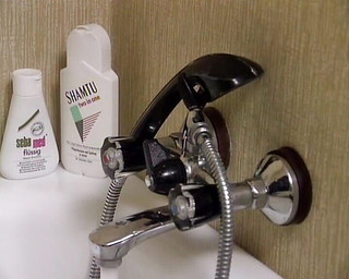 A Sexy Dark Haired German Babe Gets Her Hairy Twat Pounded in the Bathroom