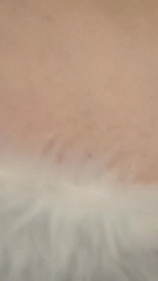 Miss Santa Doing a Sexy Striptease Showing Big Boobs