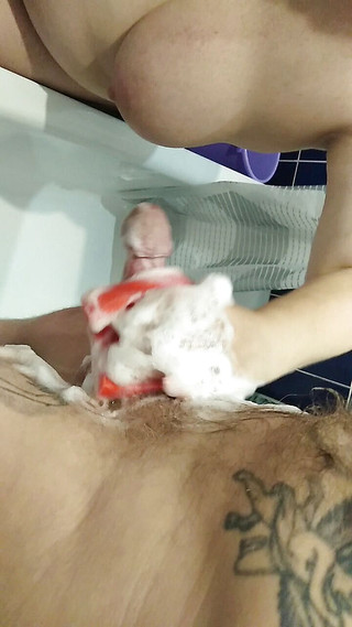 Fingering my cock with a soapy sponge