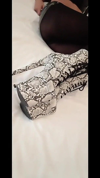 MILF in Latex Outfit, Stockings, and Heels