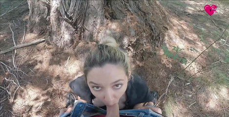 She sucks me behind a pine tree