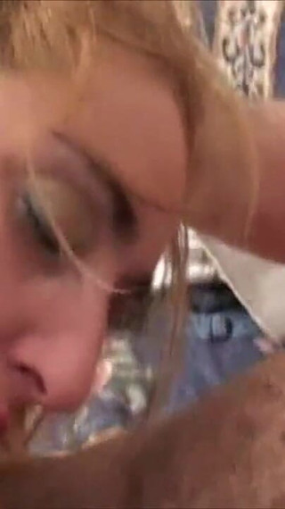 Blonde chick sucks his cock in close up