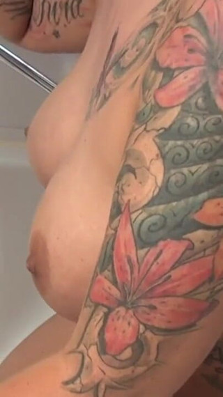 Tattooed big boobs loves the cock in pussy in mouth in the bathroom