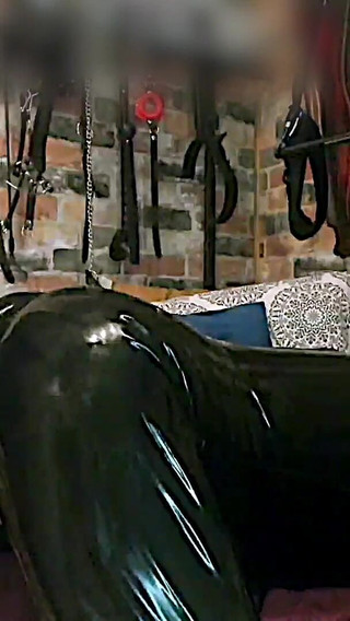 Large Strap-on Gapes Gigi in Latex Catsuit