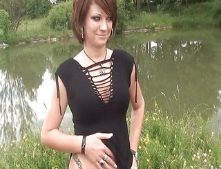 Small titted brunette in an outdoors sensual scene