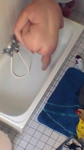 Sexy chubby amateur fucks herself in the bathroom
