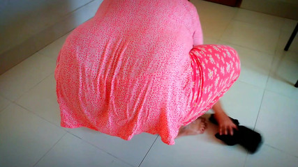 Desi Stepmother in Law Gets Stuck Under Table While Cleaning Dining Room.