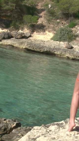 Small tit brunette dancing for the camera