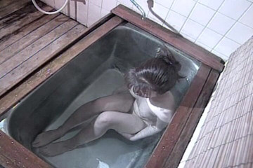 Solo Asian Teen Rubs Her Hairy Twat in the Jacuzzi