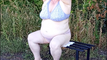 Stepmom in the Park Undressing and Masturbating on a Bench