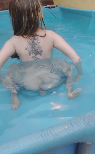 Riding a dildo in the pool