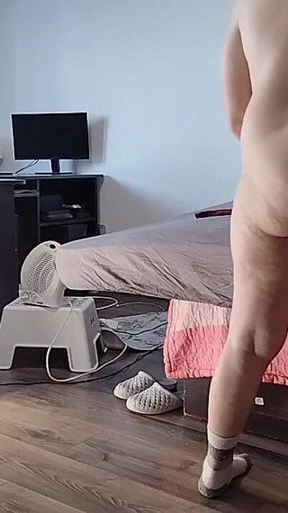 Sexy Latina Having Fun Trying on Clothes and Cutting Them.