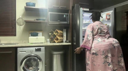 Ebony MILF Moaning and Stripteasing in Kitchen